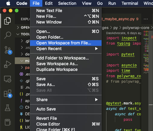File -> Open Workspace from File